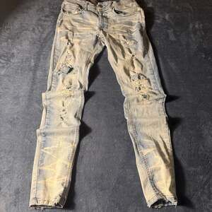 ARKETYPE Distressed Skinny Jeans